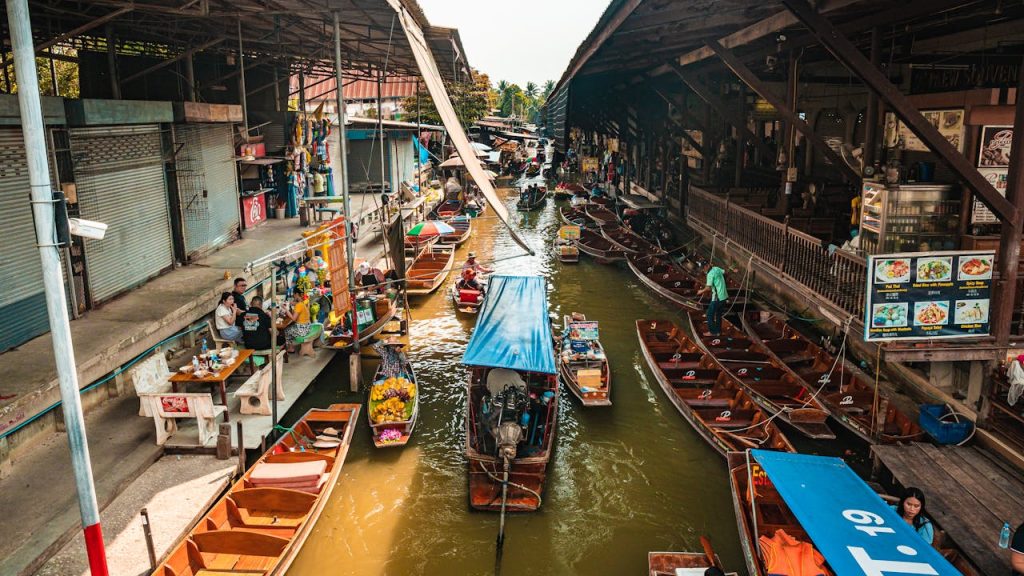 pexels photo 4318375 Bustling floating market in Bangkok with colorful boats and traditional vendors along the canal.